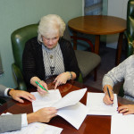 Al Kaiser completing a power of attorney in his Rockland County office